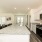 Modern Kitchen in New Construction Home at Alterra Sierra Vista, Near Iowa Colony