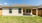 Fenced backyard with covered patio in a newly constructed rental home at Alterra Sierra Vista, near Sugar Land, TX.