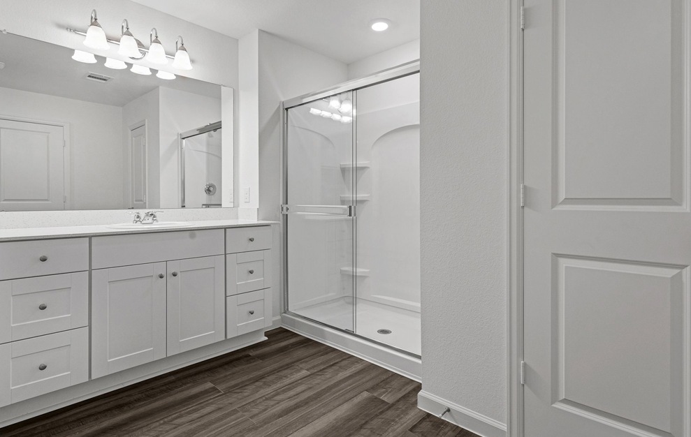Spacious bathroom with large mirrors