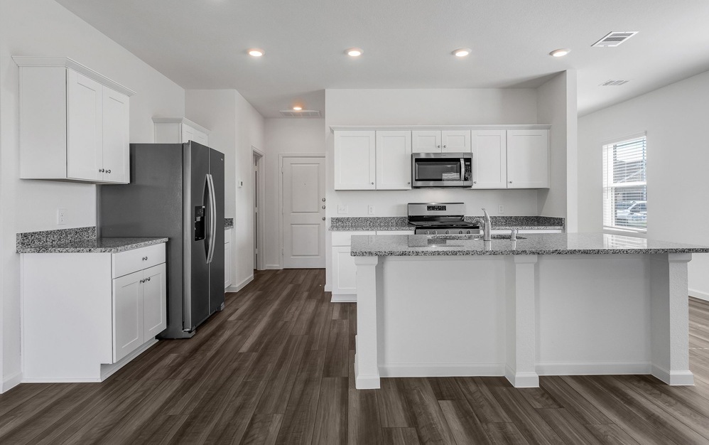 Well-lit kitchen with ample counter space