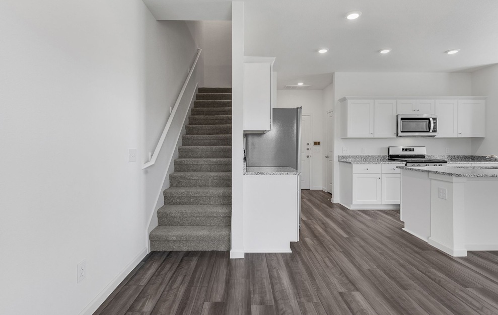 Open space living area with natural lighting