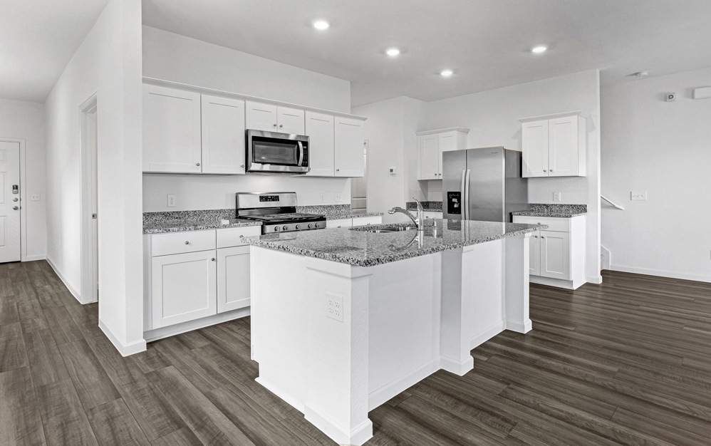 Well-lit kitchen with ample counter space