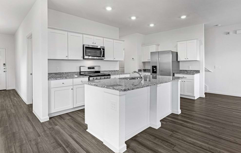 Well-lit kitchen with ample counter space