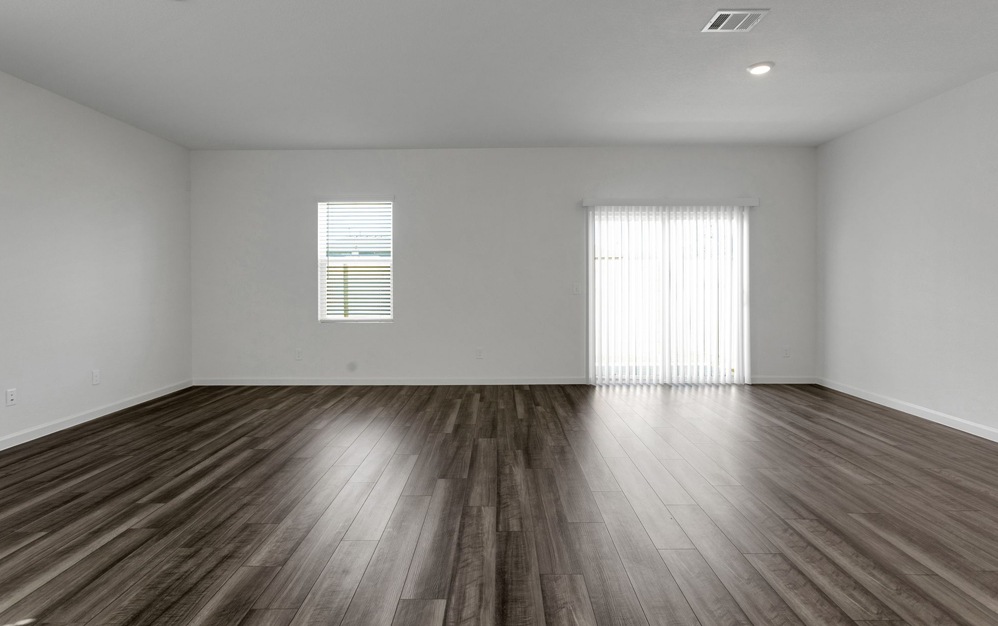 Open space living area with natural lighting