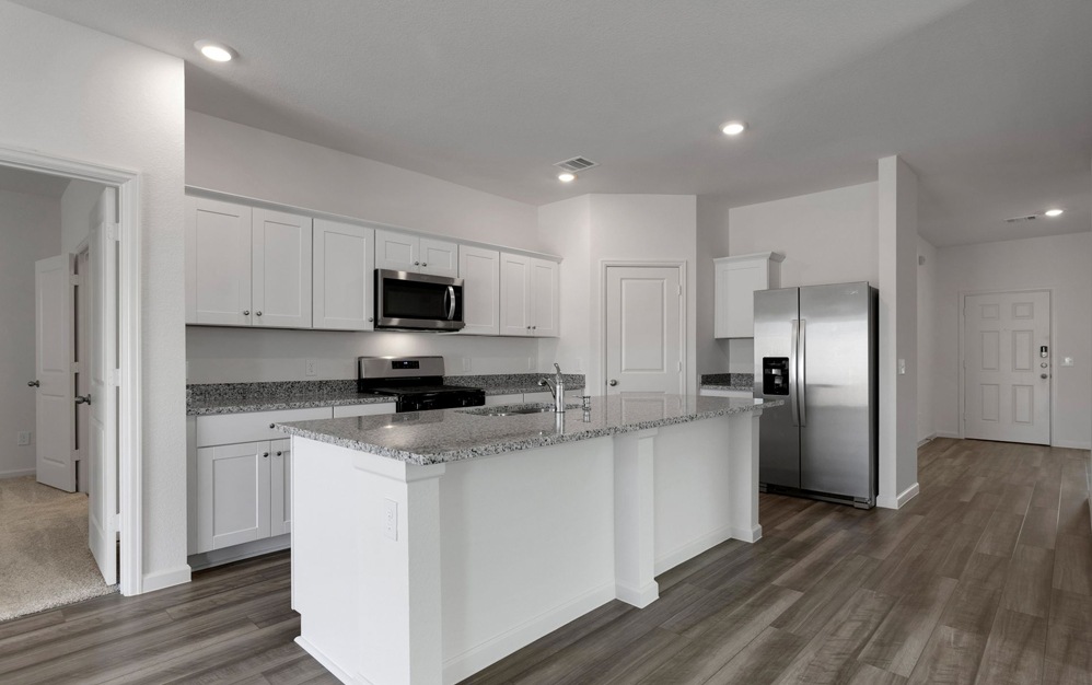 Well-lit kitchen with ample counter space